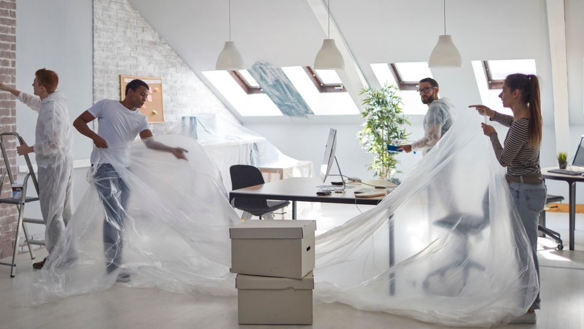 People renovating a modern office space.